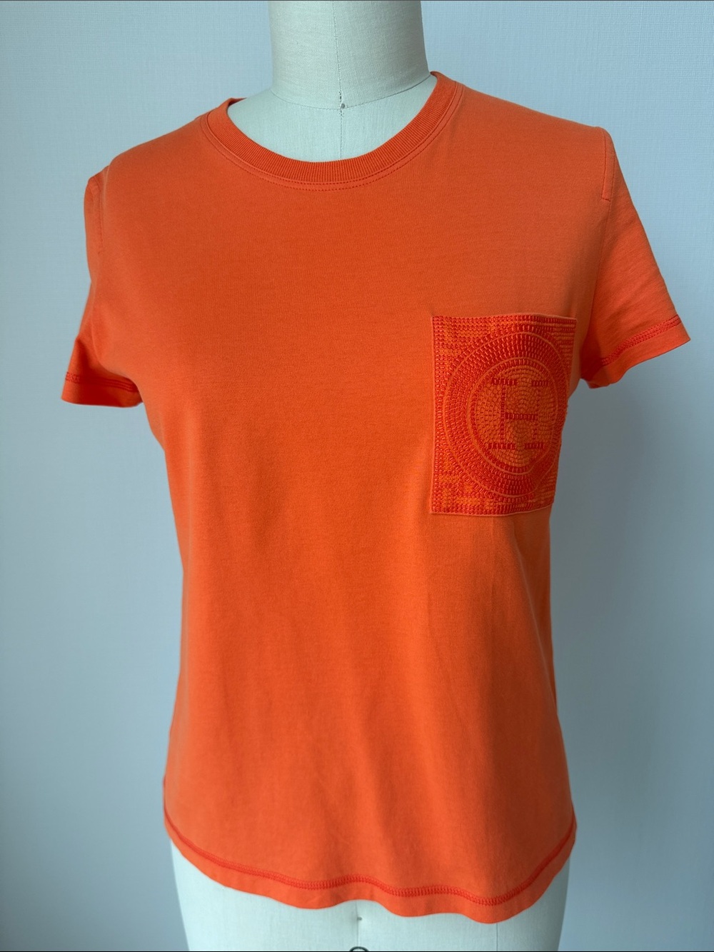 Hermes Women's Orange 🍊 Short Sleeve TShirt Top with a pocket, Size 38 ( US 4 )